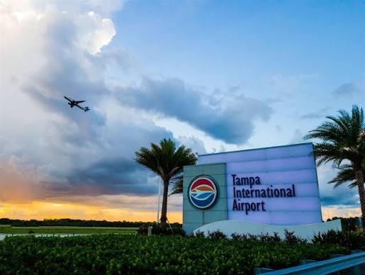 Tampa International Airport sign at sunset